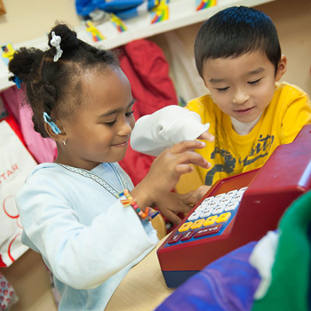 Two Young Children Playing